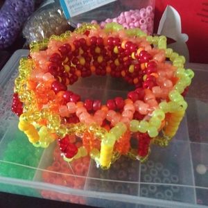 Upper arm carousel kandi cuff